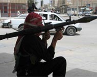 A member of al-Mahdi Army with a rocket-propelled grenade