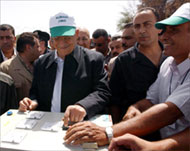 Mahmud Abbas inaugurating awater well: self-rule at last?