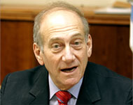 The pullout is an early test for Ehud Olmert ahead of elections