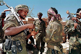 Eritrean soldiers patrol near the country's border. Eritrea remains a key player in the Horn of Africa's evolving security landscape [POOL/ALEXANDER JOE/AFP]
