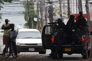 Jamiacan Police in the street market