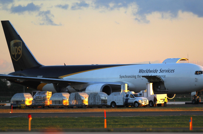 Grounded UPS plane being unloaded after Yemen bomb scare