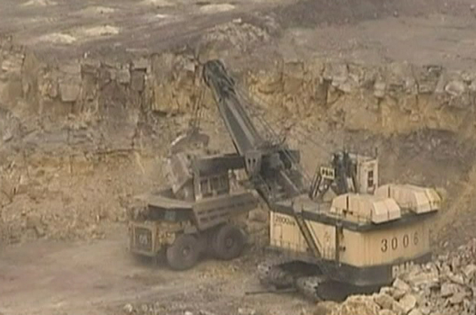 Bulldozer digging for rare elements