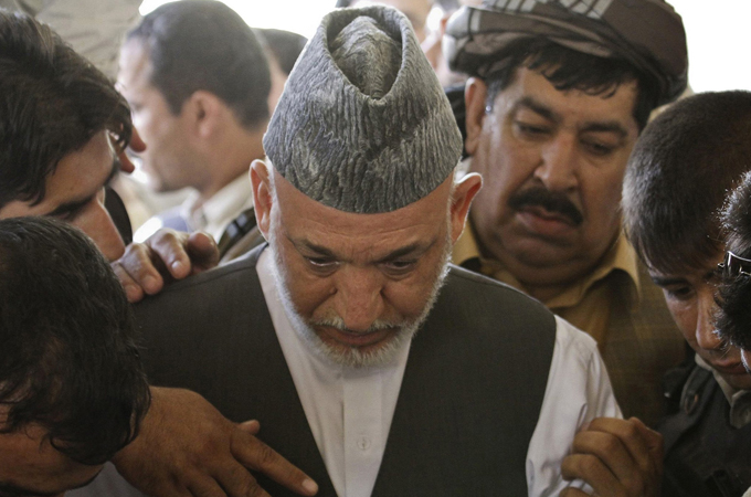 Karzai lead''s brother''s funeral prayers