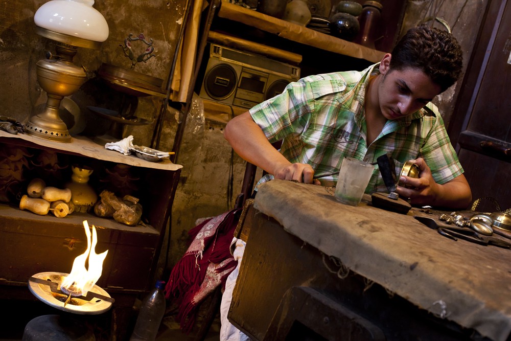 Hossam, is an 18-year-old craftsman working in a workshop opened by his great grand-father. "I started working here When I was eight," he said. "Now things are changing, the raw materials are getting too expensive; taxes are too high. We keep on producing for export but our main income is from tourists and the revolution was a sharp blow to us."