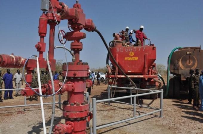 Workers at the Petrodar oil concession f
