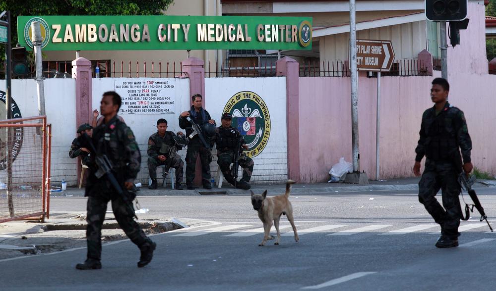 Soldiers patrol the main streets of the southern Philippine city of Zamboanga. 