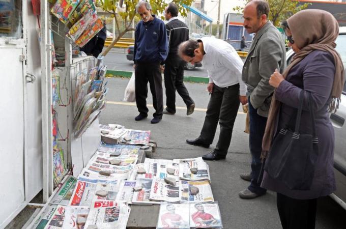 Iranians waited with bated breath for news from Geneva [AFP]