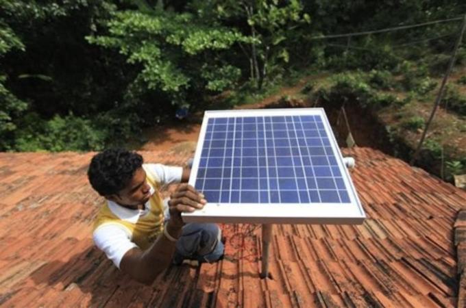 Cities around the world have undertaken renewable energy projects to cut their carbon emissions [AP]