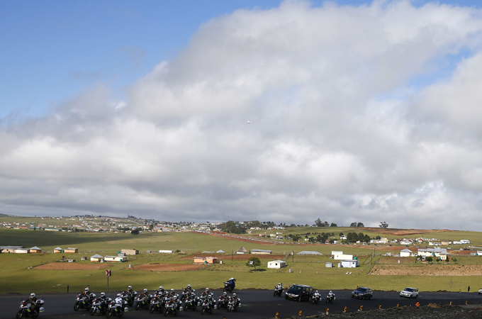 The body of former South African President Nelson Mandela is driven through his homeland just outside Qunu [Reuters]