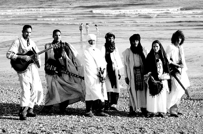 Malian Tuareg musicians Tinariwen lived the 'ishumar' epic at first hand, the author writes [GALLO/GETTY]