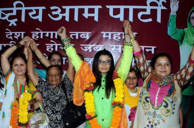 Indian actress Rakhi Sawant (third right) is running for the Mumbai North-West constituency on April 24 [AFP]