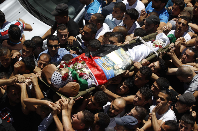 One man died and dozens were injured during a massive demonstration in the West Bank this week [Reuters]