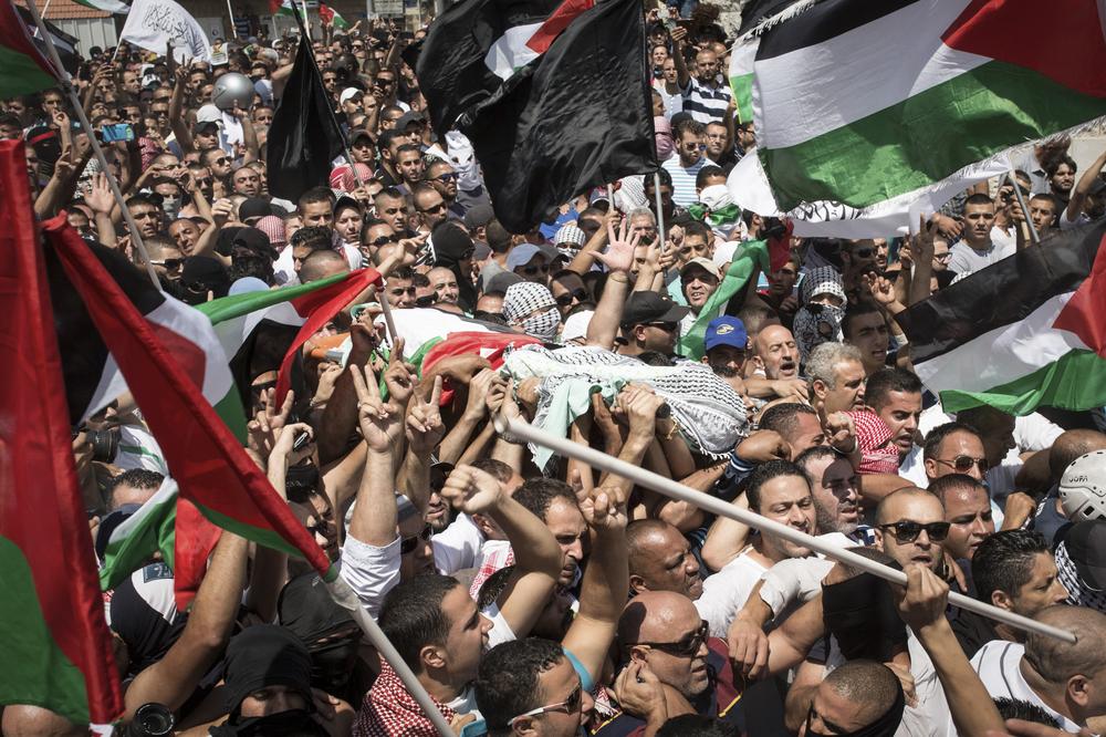 <p>Thousands of mourners turned out for Mohammed Abu Khdair(***)s funeral. The 16-year-old(***)s body was found badly burned in a Jerusalem-area forest.</p>