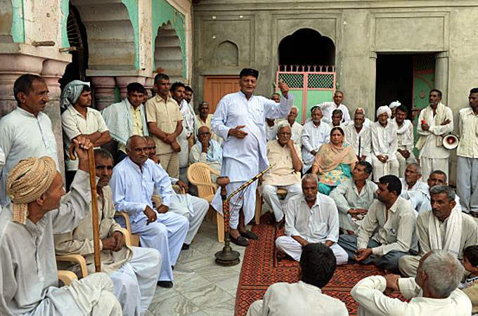 Village councils have often been blamed for supporting severe punishments. [Sajjad Hussain/AFP/Getty Images]