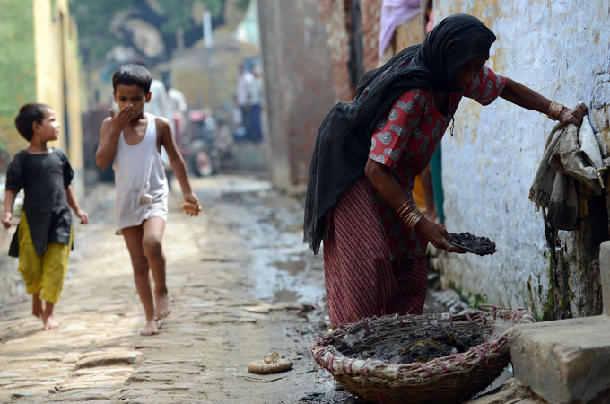 Rights groups have called for an end to practice of low-caste Indians manually collecting human waste [AFP]