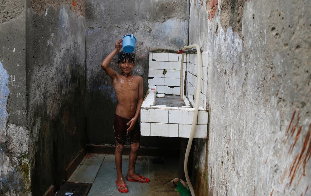 <p>"Every day after school, I come to take a shower in this private bathroom for five rupees ($0.08), because there is no water at my home. We buy water for drinking but can(***)t afford it for other purposes," says Mohmmad Ansari, 12, of the Sanjay colony neighbourhood in South Delhi. </p>