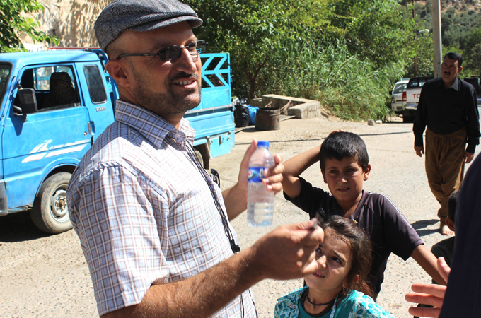 Saydo Ashur Yousif and his family walked for days to reach safety [Adam Valen Levinson/ Al Jazeera] 