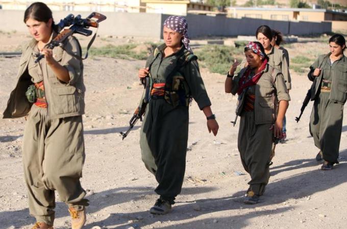 Military styles have been co-opted by both haute couture and youth culture for decades, writes Ismail [AFP]