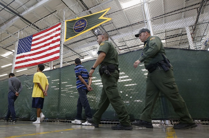 Hundreds of immigrant children are processed and held at the Nogales Placement Center in Arizona [AP]