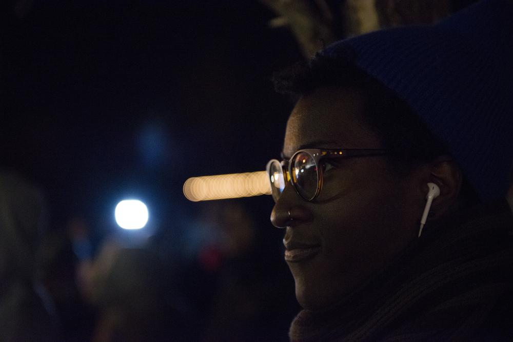 <p>A young protester across the street from the Ferguson Police Department in the early hours of the evening.</p>