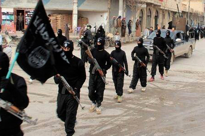 A group of special police, called al-Hisba, ensures adherence to ISIL laws in public [AP]