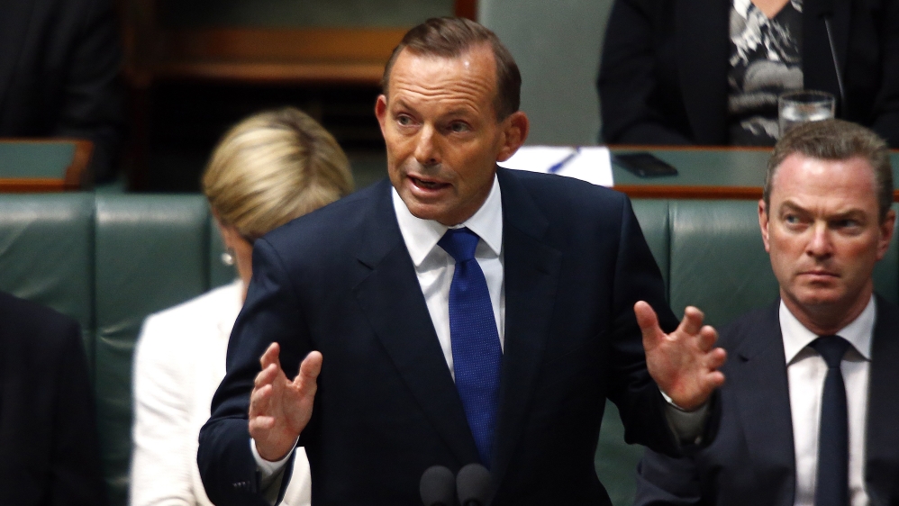 Australian PM Abbott speaks in the Australian Parliament in Canberra