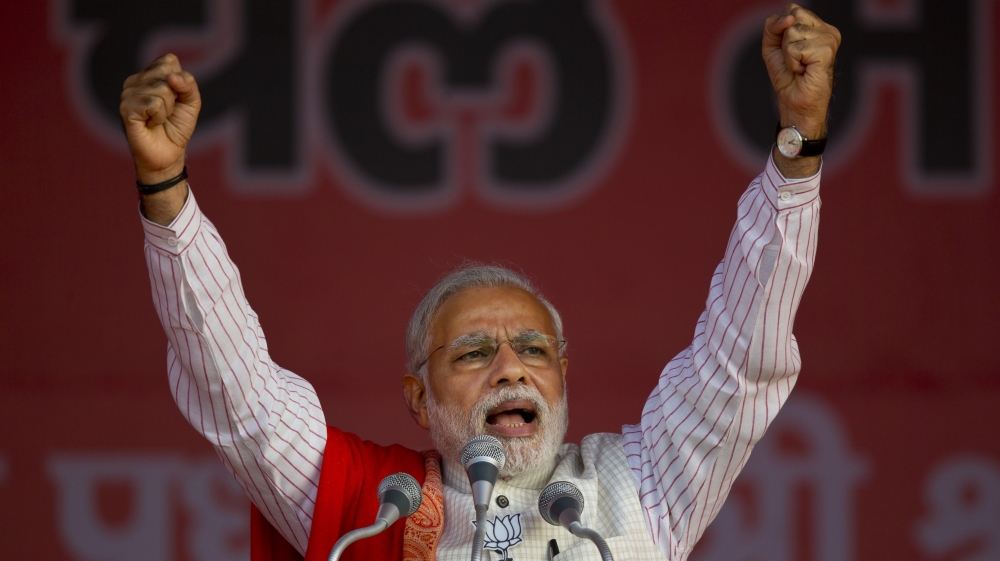 Indian Prime Minister Narendra Modi addresses an election campaign rally [AP]