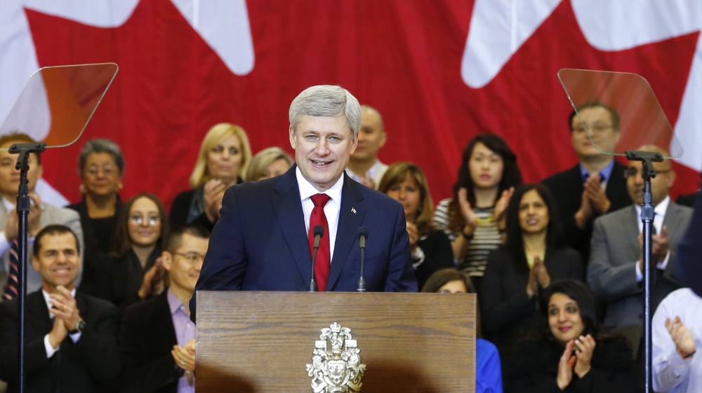 Canadian PM Harper speaks at a news conference in Richmond Hill