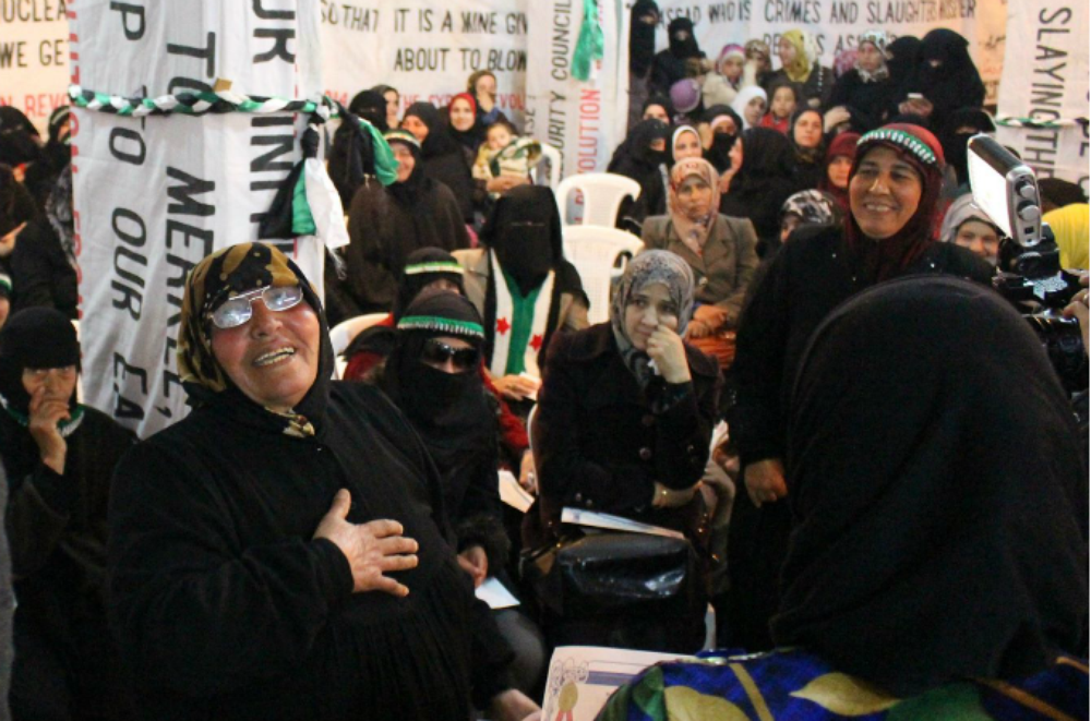 Dozens of women mark IWD in Idlib
