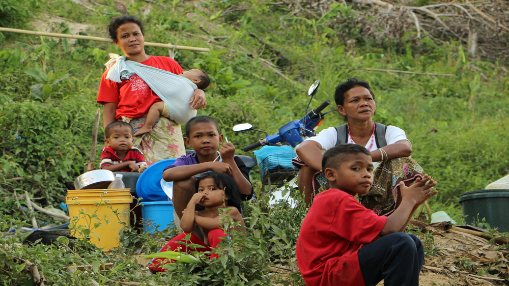 
Most indigenous people who make up 11 percent of the country's population live in Sabah and Sarawak. Orang Asli, the indigeous people of penninsular Malaysia, only make up less than one percent.[Jarni Blakkarly/Al Jazeera]
