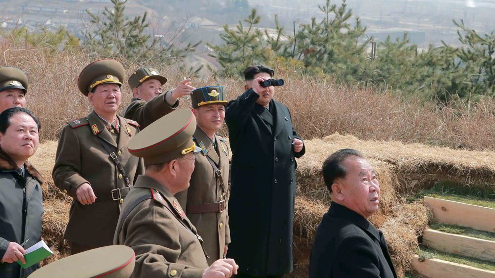 North Korean leader Kim Jong Un watches over military air force exercises