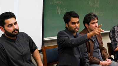 Arafat Mazhar, centre, is using Islamic legal reasoning to deconstruct Pakistan's blasphemy law [Omar Imran Malik/Al Jazeera]