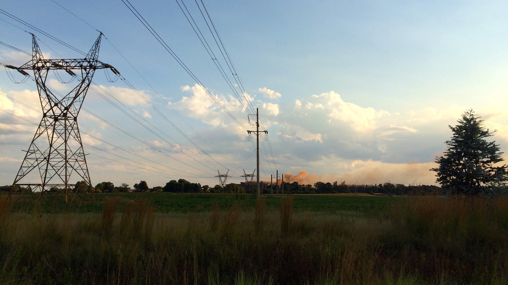 Electrical wires supply electricity to coal mines in South Africa's Mpumalanga province [Victoria Schneider/Al Jazeera]