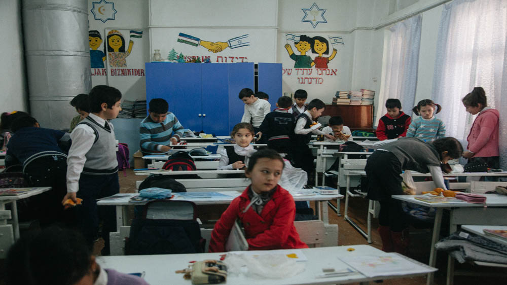 Since the collapse of the Soviet Union, children of the Bukhara Jewish community are able to attend Jewish schools [Timur Karpov/Al Jazeera]