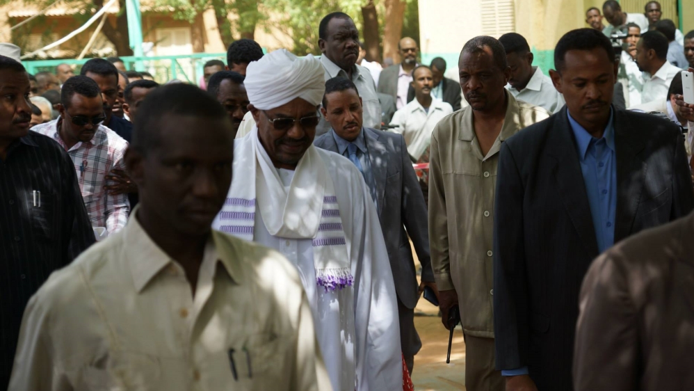 Omar al-Bashir, wanted by the International Criminal Court for war crimes and genocide, is expected to win by a landslide [Fatma Naib/Al Jazeera] 