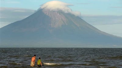 A family takes a swim in Lake Nicaragua. Once built, the transoceanic canal will run through the lake [Lindsay Fendt/Al Jazeera] 