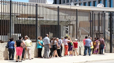 Cubans line up outside the US interests section in Havana [Robert Kennedy/Al Jazeera]