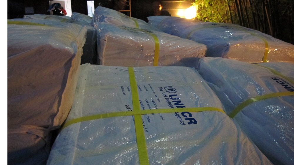 UNHCR has worked with The Yellow House volunteers who collected 2,200 tarps last week for distribution [Annette Ekin/Al Jazeera]