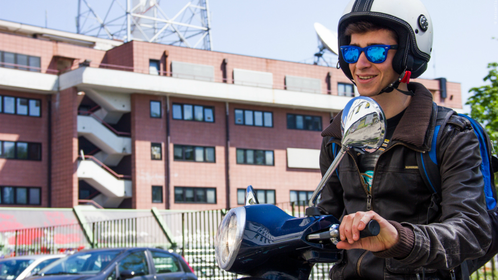 Pietro Falda is one of the few students in his high school class to own a moped [Antonella Corigliano/Al Jazeera]