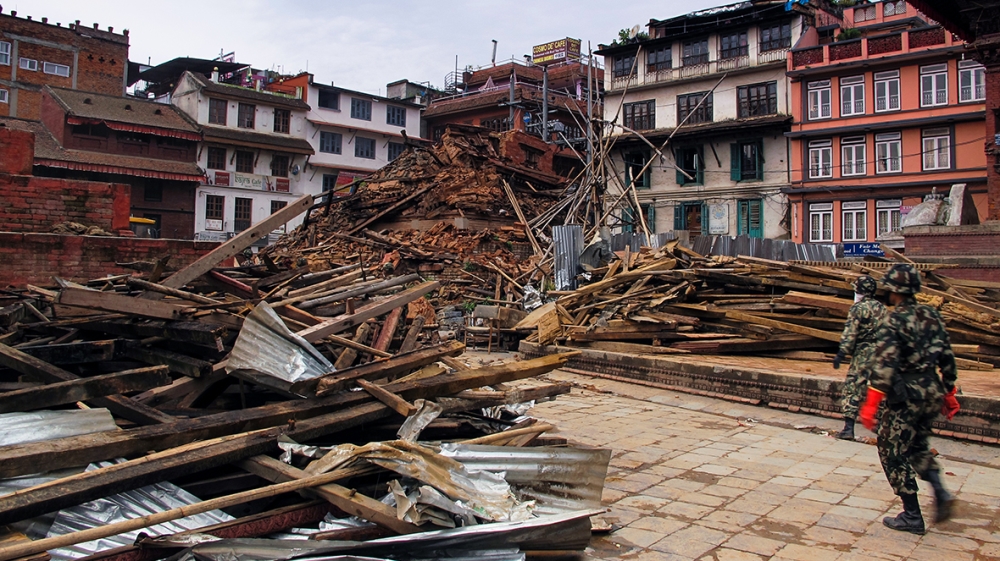 Many standing structures may need to be torn down after conservation experts inspect them [Annette Ekin/Al Jazeera]