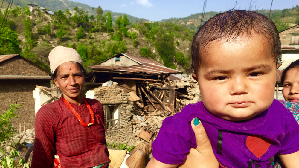 Monsoon rains are coming and people in Nepal's villages, like Paudel, urgently need to rebuild their shattered lives [Tiffany Ang / Al Jazeera]