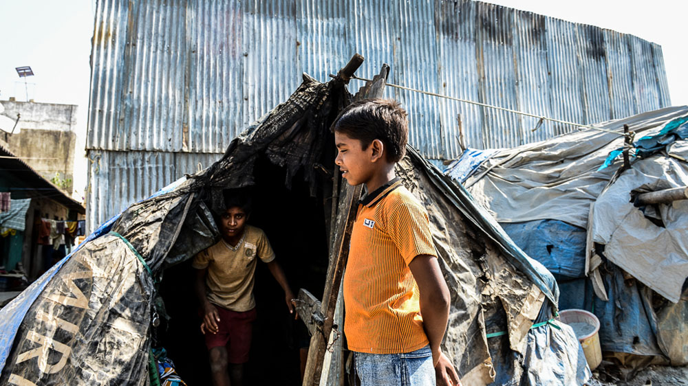Many working children in India's big cities come from migrant families, who leave their villages in search of better opportunities [Felix Gaedtke/Al Jazeera]
