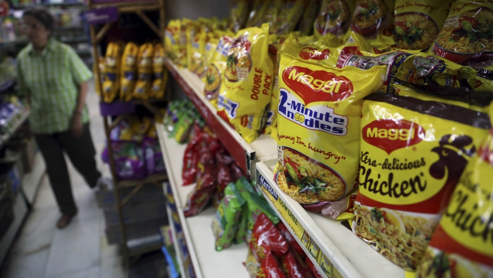 Packaged food with "Maggi" sign on it are displayed at a grocery store in Bangalore, India, Friday, June 5, 2015. India''s Health Ministry announced Friday that Nestle''s po