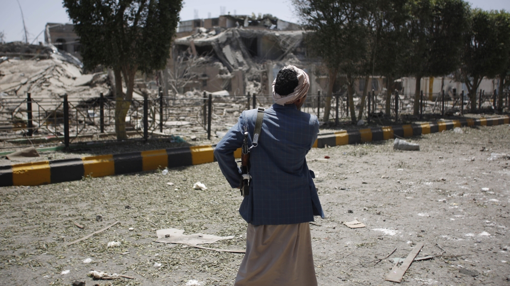 Man in Yemen stands by road