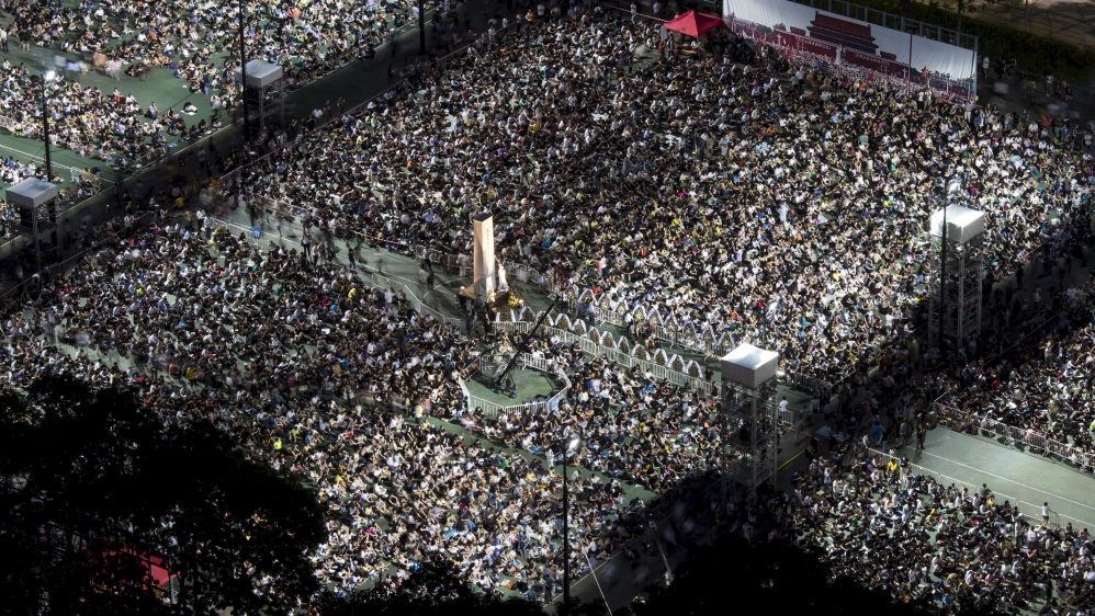 Thousands of people attend an annual candlelight vigil at the Victoria Park in Hong Kong