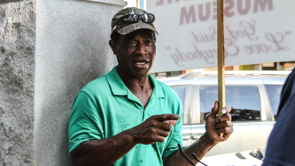 Willie Hudspeth has been protesting the monument for the last 15 years [Shaghayegh Tajvidi/Al Jazeera]