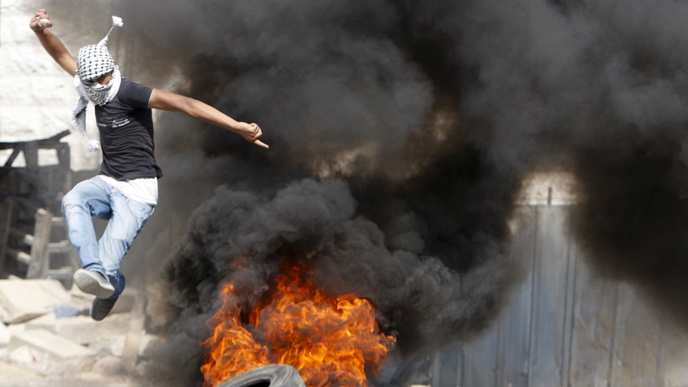 Palestinians clashed with Israeli troops in the West Bank on Friday following the funeral of Ali Saad Dawabsheh [Reuters]