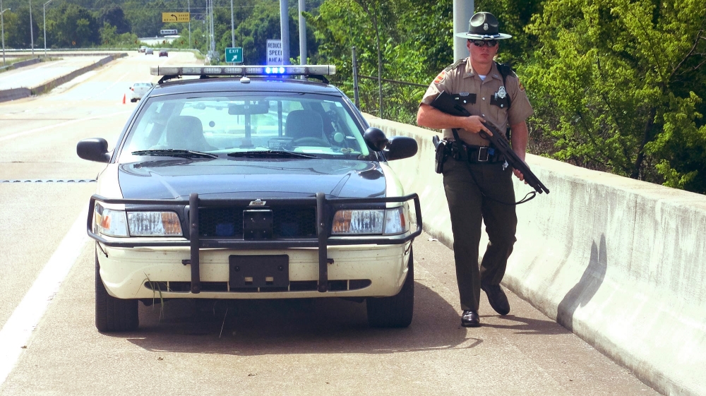 The US Navy confirmed in a tweet early on Thursday afternoon that a shooting had taken place at a recruitment centre on Amnicola Highway [Tim Barber/Chattanooga Times Free Press via AP] 