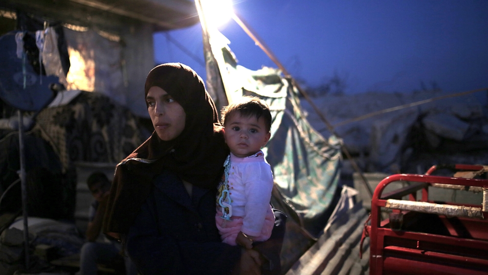 Many families in Gaza have been living in the ruins of their homes [EPA]